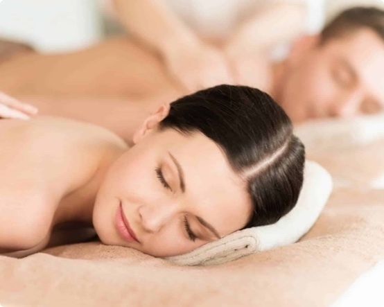 man and woman getting a massage